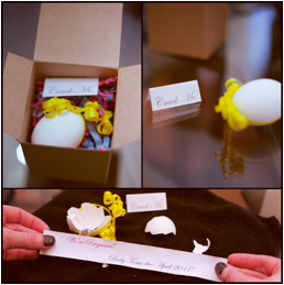 maternity announcement with paper scrolls in eggs