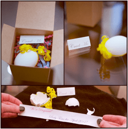 maternity announcement with paper scrolls in eggs